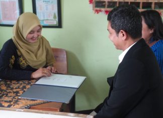 Kemendukbangga/BKKBN Jatim Dorong Ayah Ambil Rapor Anak Sentuhan Cinta dalam Pendidikan